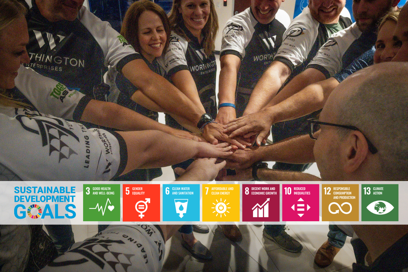 Team putting hands together